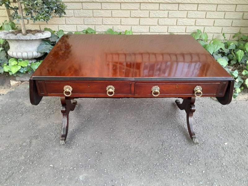 A Victorian Circa 1870, Mahogany Drop-side Library Table, With Drawers and Brass Escurcheons (the...