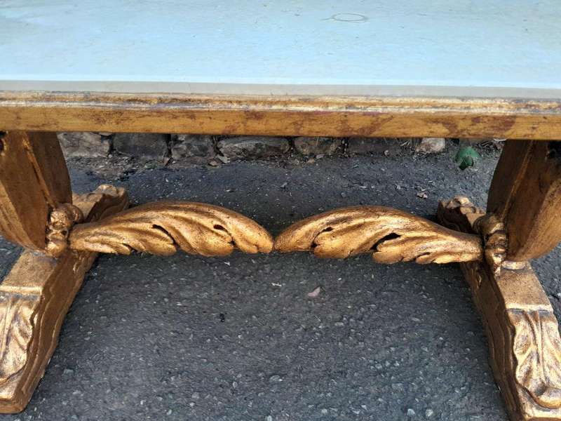 A 20th Century Carved and Giltwood Coffee Table with Marble Top