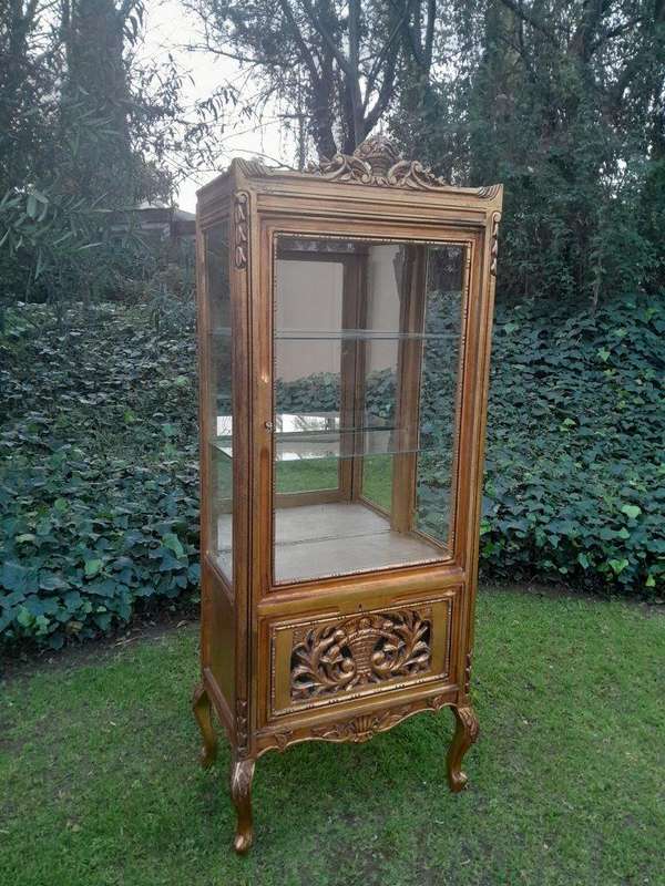 A French Louis XVI Showcase From The 1800s Gilded With Gold Leaf