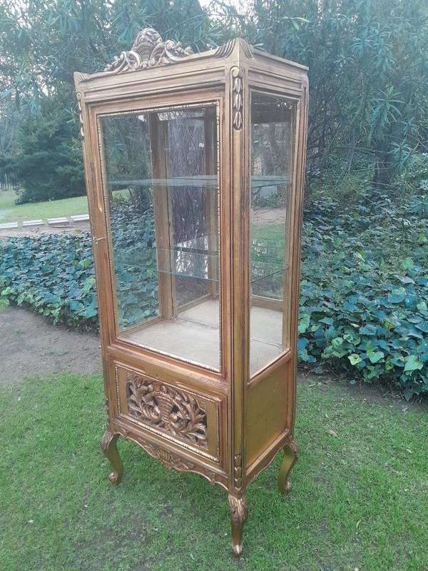 A French Louis XVI Showcase From The 1800s Gilded With Gold Leaf