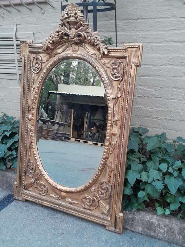 A 20th Century Ornately Carved and Bevelled Gilt-wood  Mirror