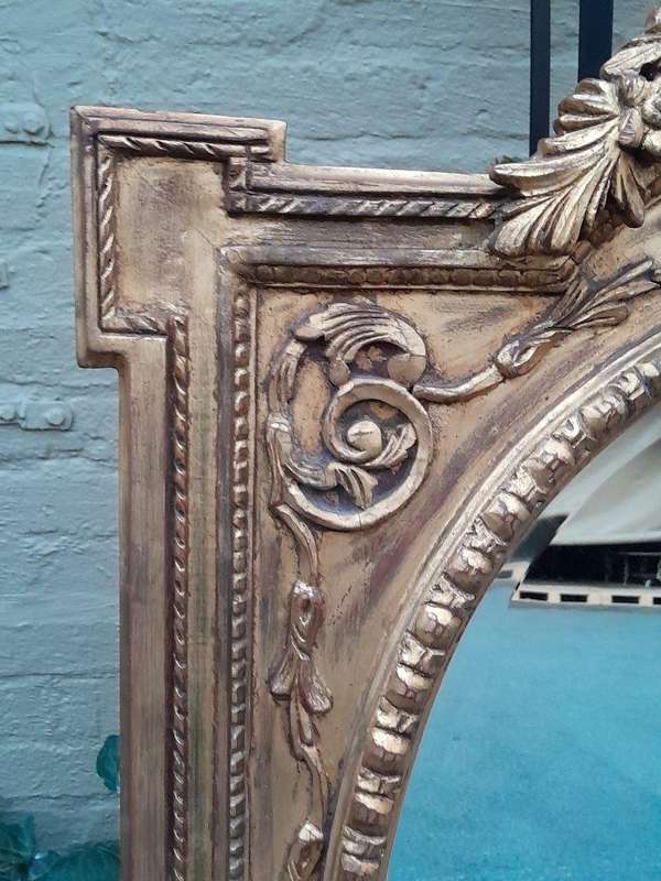 A 20th Century Ornately Carved and Bevelled Gilt-wood  Mirror