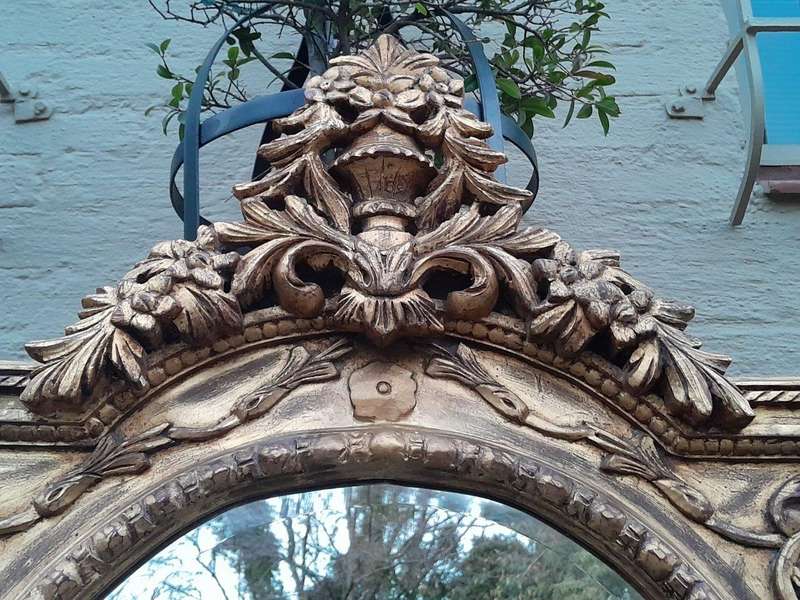 A 20th Century Ornately Carved and Bevelled Gilt-wood  Mirror