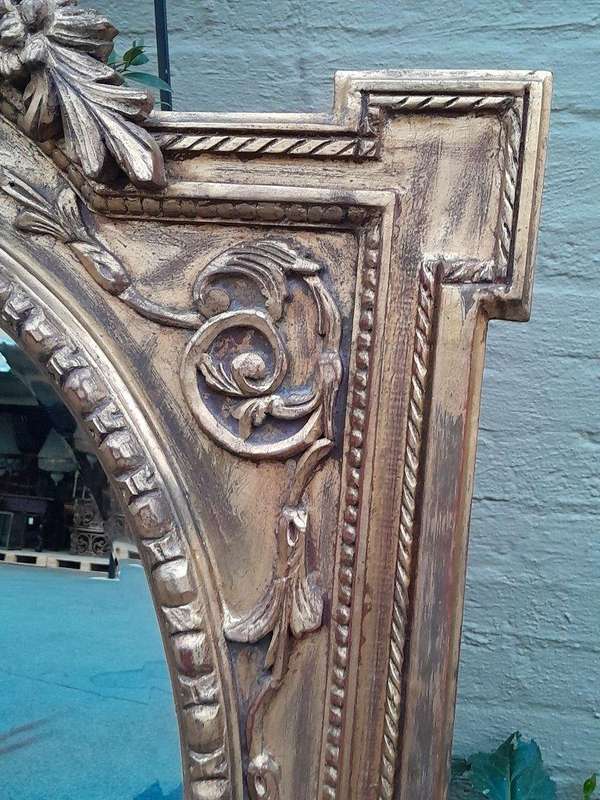 A 20th Century Ornately Carved and Bevelled Gilt-wood  Mirror