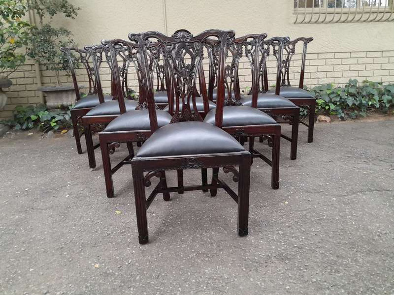 A 20th Century Set of Ten English Mahogany Chippendale Style Chairs with Leather Upholstered Seats