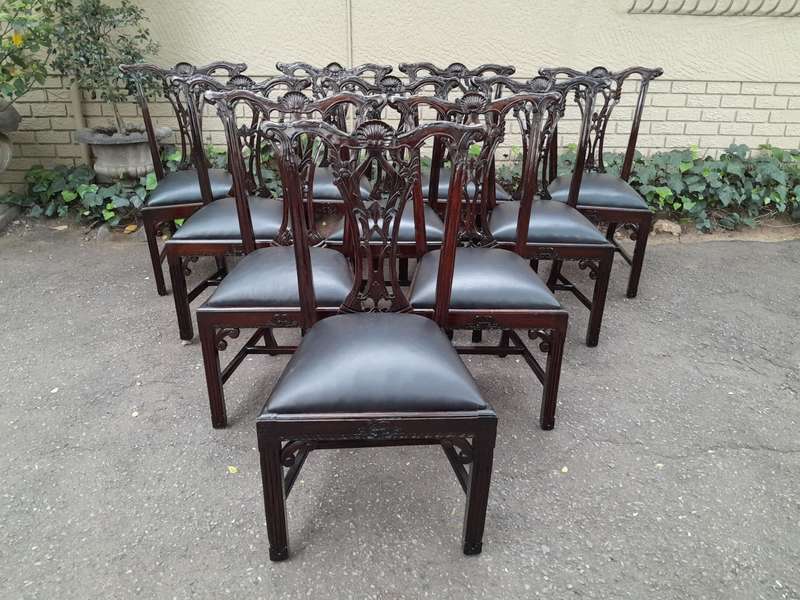 A 20th Century Set of Ten English Mahogany Chippendale Style Chairs with Leather Upholstered Seats
