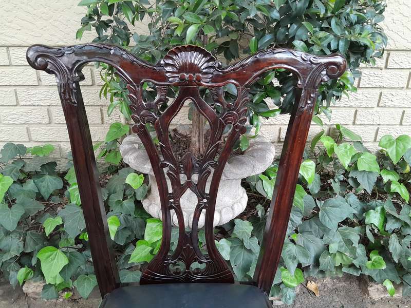 A 20th Century Set of Ten English Mahogany Chippendale Style Chairs with Leather Upholstered Seats