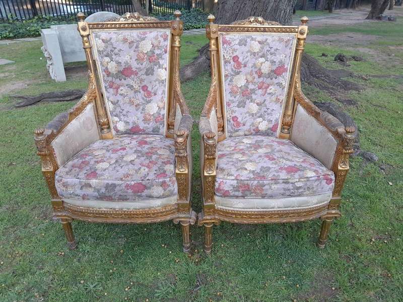 A 20th Century Pair of French Style Bergere Hand Gilded Wooden Armchairs