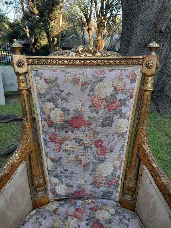 A 20th Century Pair of French Style Bergere Hand Gilded Wooden Armchairs