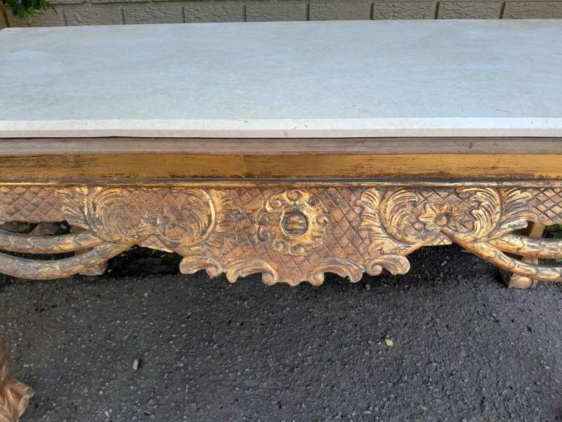 A 20th Century Ornately Carved Server/ Console/Entrance Hall Table with a Marble Top