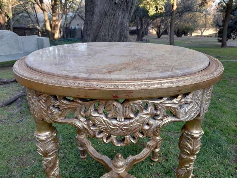 A 20TH Century French Style Carved and Hand Gilded Side Table with Marble Top