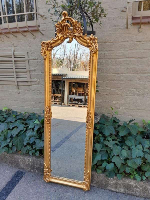 An Ornate Rococo French Style Carved Bevelled Mirror