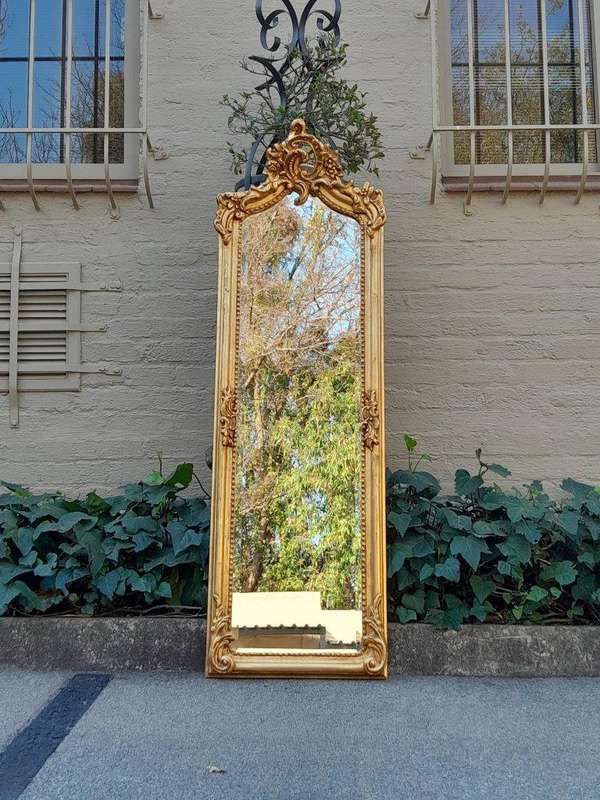 An Ornate Rococo French Style Carved Bevelled Mirror