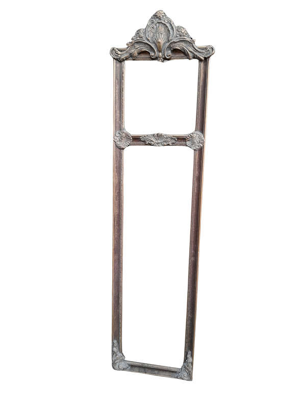 An Ornate Carved Rococo French Style Bevelled Mirror