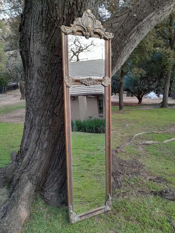 An Ornate Carved Rococo French Style Bevelled Mirror