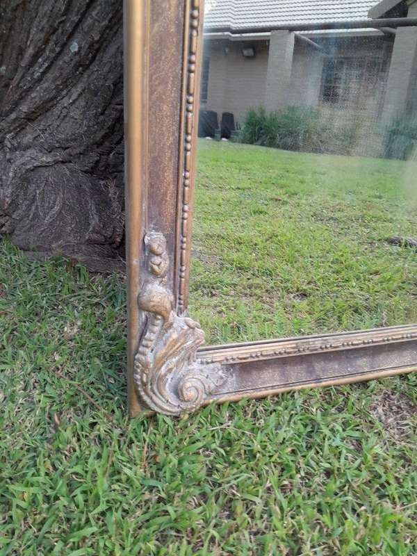 An Ornate Carved Rococo French Style Bevelled Mirror