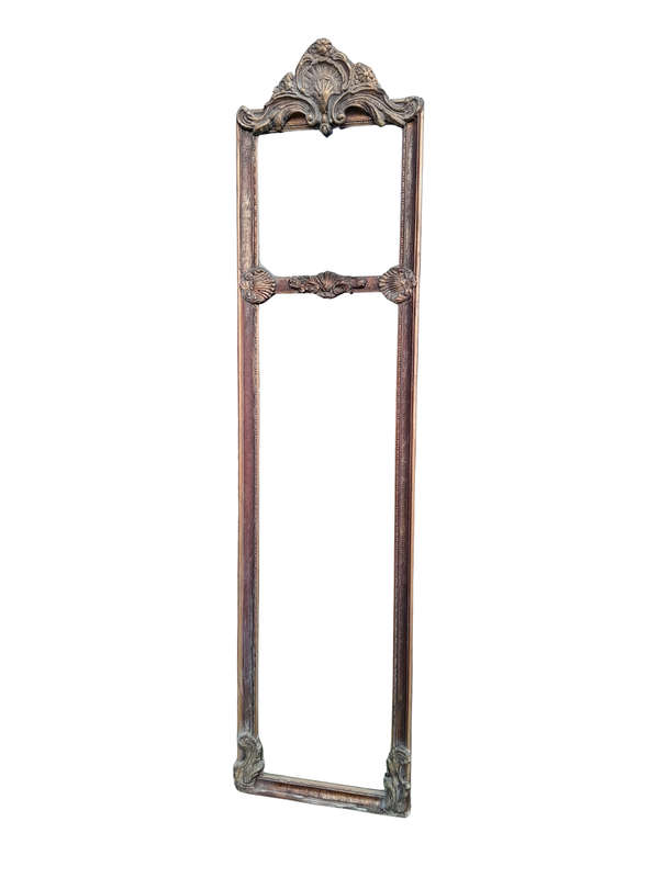 An Ornate Carved Rococo French Style Bevelled Mirror