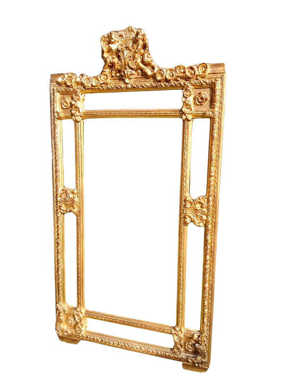 A French Style Ornately Carved and Gilded Bevelled Mirror