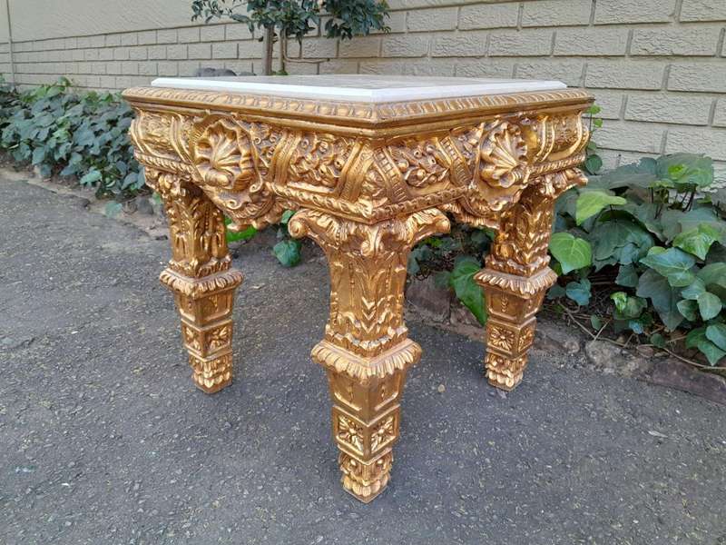 A 20th Century French Style Ornately Carved Side Table with Marble Top