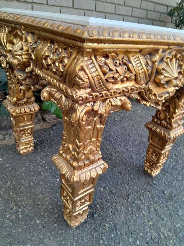 A 20th Century French Style Ornately Carved Side Table with Marble Top