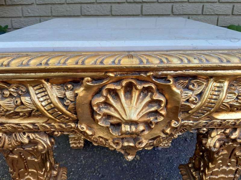 A 20th Century French Style Ornately Carved Side Table with Marble Top