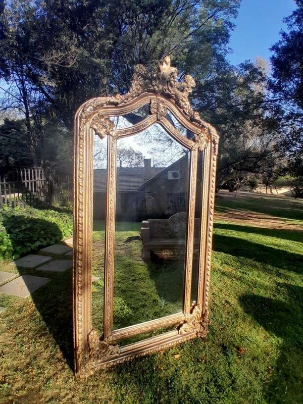An Ornate Carved Rococo French Style Bevelled Mirror