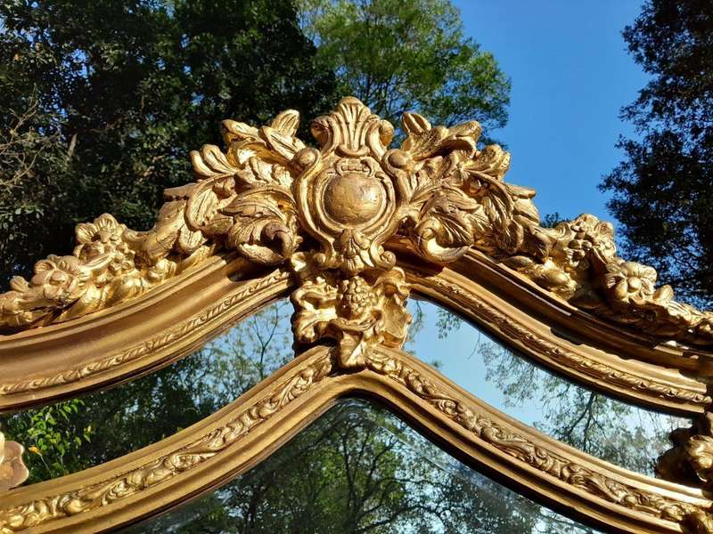 An Ornate Carved Rococo French Style Bevelled Mirror