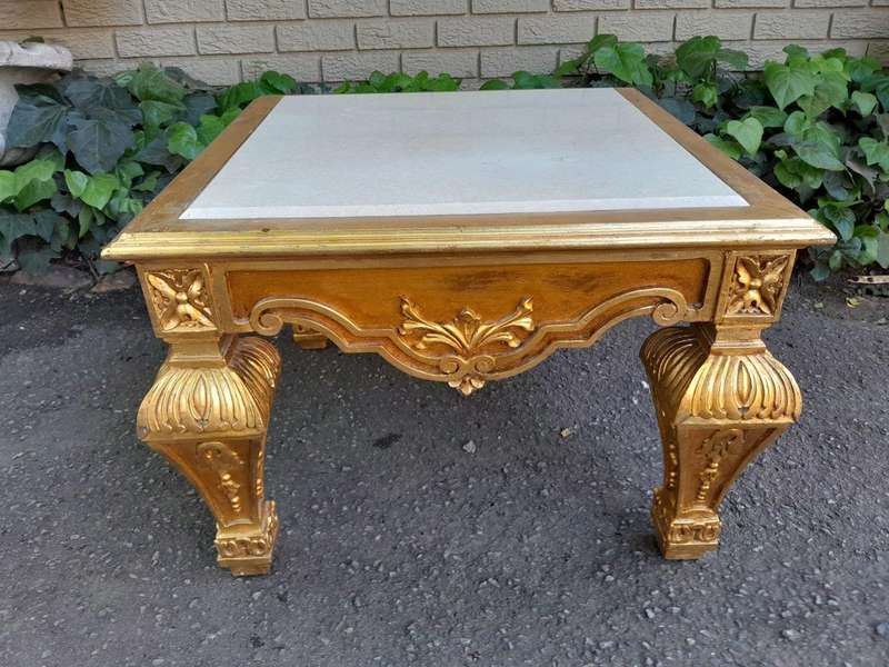 A 20th Century French Style Ornately Carved Side Table with Marble Top