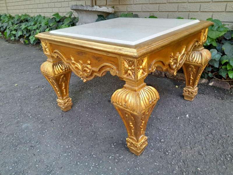 A 20th Century French Style Ornately Carved Side Table with Marble Top