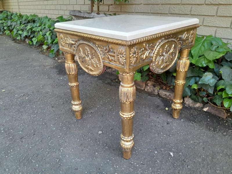 A 20th Century French Style Ornately Carved Side Table with Marble Top