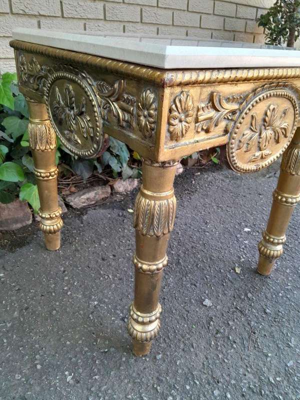 A 20th Century French Style Ornately Carved Side Table with Marble Top
