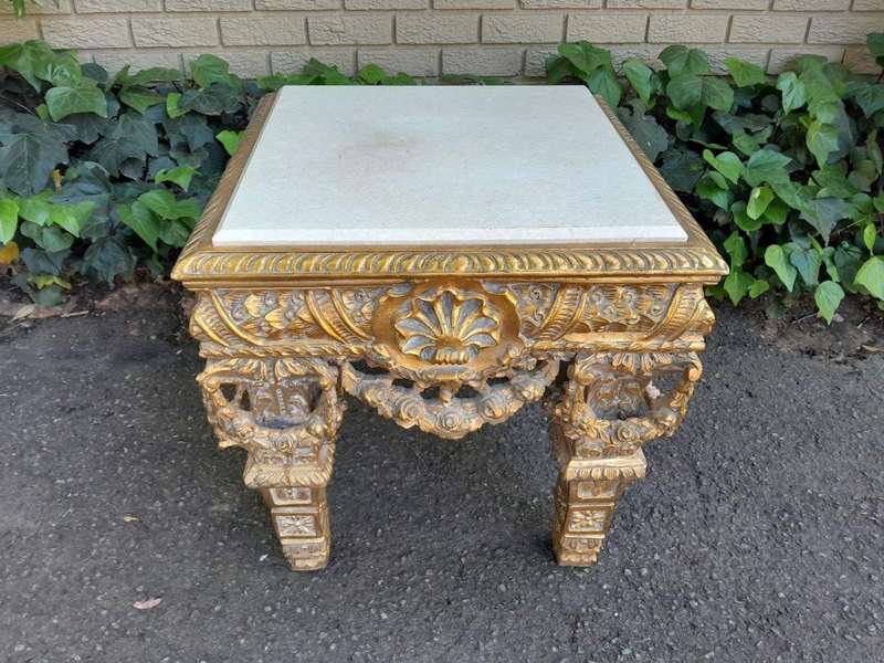 A 20th Century French Style Ornately Carved Side Table with Marble Top