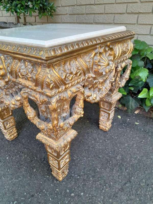A 20th Century French Style Ornately Carved Side Table with Marble Top