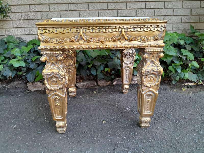 A 20th Century French Style Ornately Carved Side Table with Marble Top