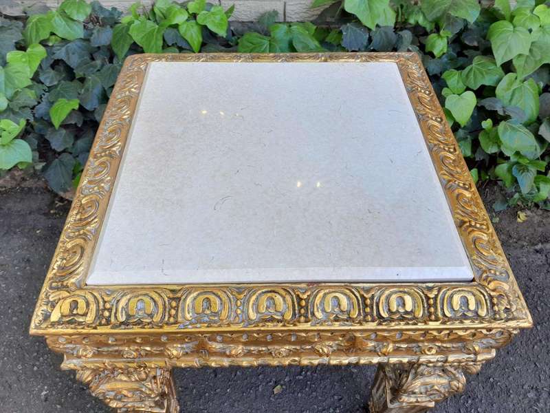 A 20th Century French Style Ornately Carved Side Table with Marble Top
