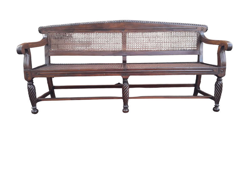 An Early 19th Century Rosewood Colonial Carved Bench with New Rattan in an Ebonised Finish
