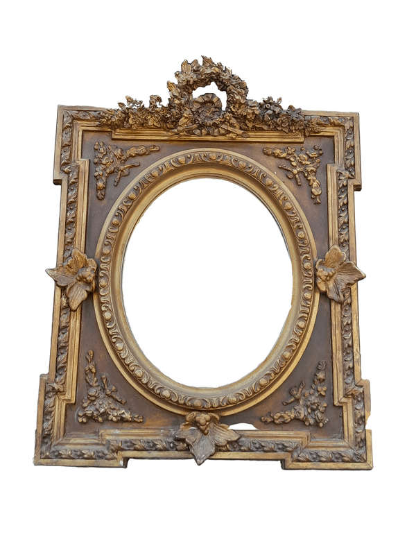 A 20th Century French Style Ornately Carved and Gilded Bevelled Mirror