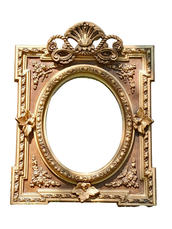 A 20th Century French Style Ornately Carved and Gilded Bevelled Mirror