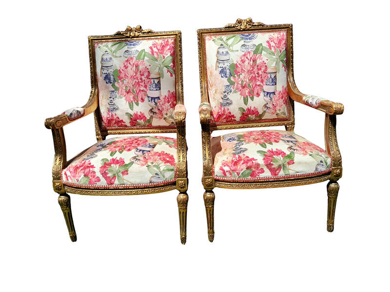 A Pair of 20th Century French Louis XVI Styled Ornately Carved and Gilded Fautelli Chairs