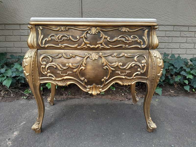 A Set of French Rococo Style Ornately Carved and Gilded Chest of Drawers and Pair of Side Tables ...