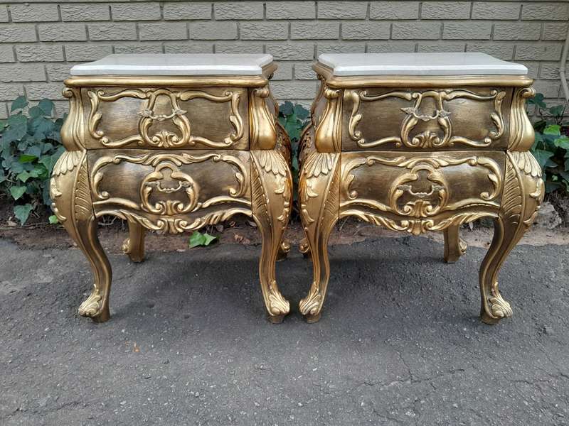 A Set of French Rococo Style Ornately Carved and Gilded Chest of Drawers and Pair of Side Tables ...
