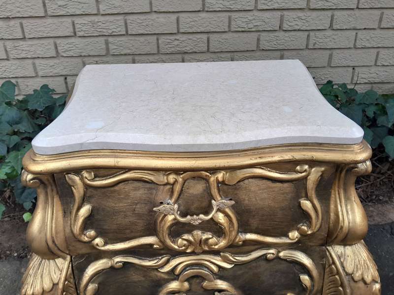 A Set of French Rococo Style Ornately Carved and Gilded Chest of Drawers and Pair of Side Tables ...