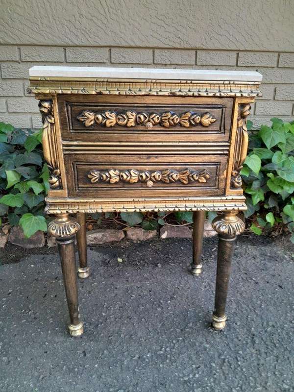 A Pair of French Style Ornately Carved Giltwood Pedestals/Side Tables with Cream Marble Tops