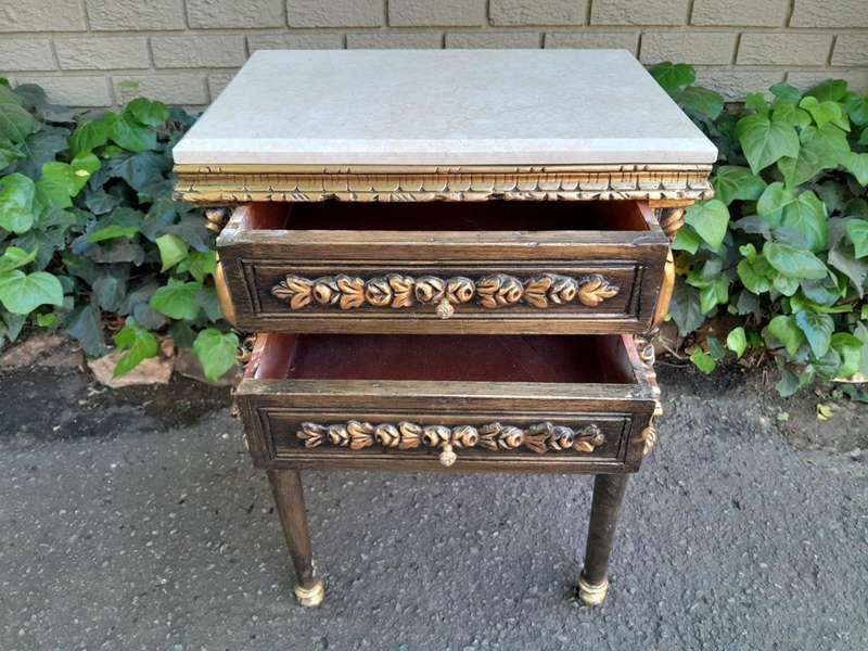 A Pair of French Style Ornately Carved Giltwood Pedestals/Side Tables with Cream Marble Tops