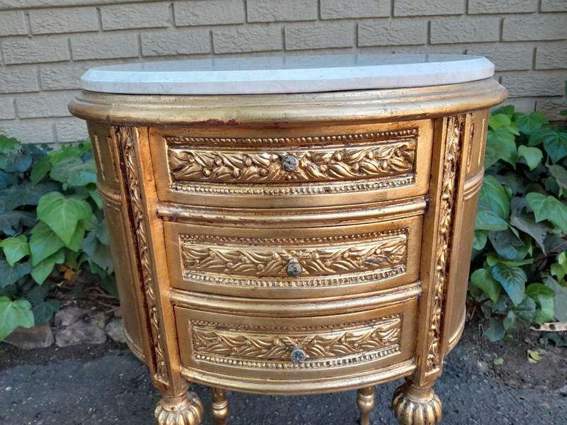 A Pair of French Style Hand-Gilded Oval Pedestals/Side Tables with Cream Marble Tops