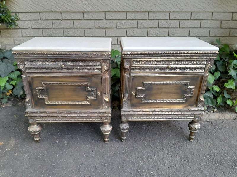 A Pair of French Style Ornately Carved Giltwood Pedestals/Side Tables with Cream Marble Tops