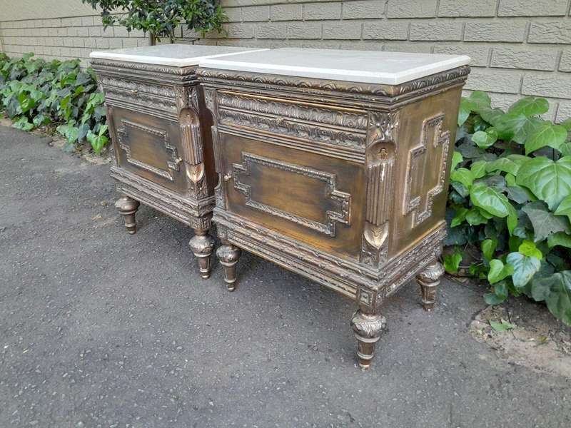 A Pair of French Style Ornately Carved Giltwood Pedestals/Side Tables with Cream Marble Tops