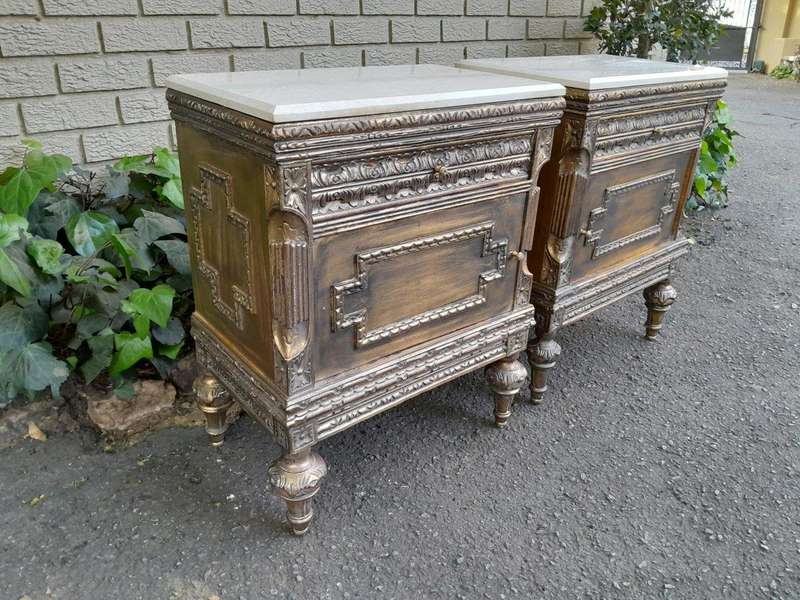 A Pair of French Style Ornately Carved Giltwood Pedestals/Side Tables with Cream Marble Tops