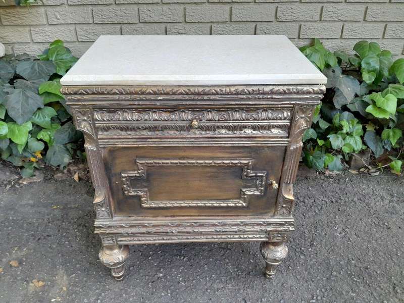 A Pair of French Style Ornately Carved Giltwood Pedestals/Side Tables with Cream Marble Tops