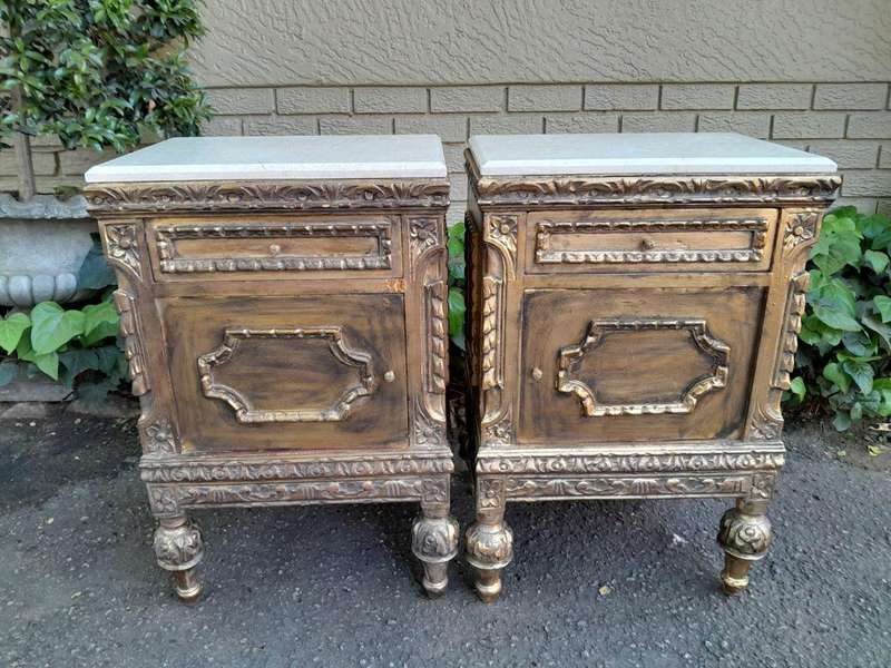 A Pair of French Style Ornately Carved Giltwood Pedestals/Side Tables with Marble Tops